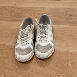 White cheer shoes. Well worn but I loved these. Can be cleaned and good as new